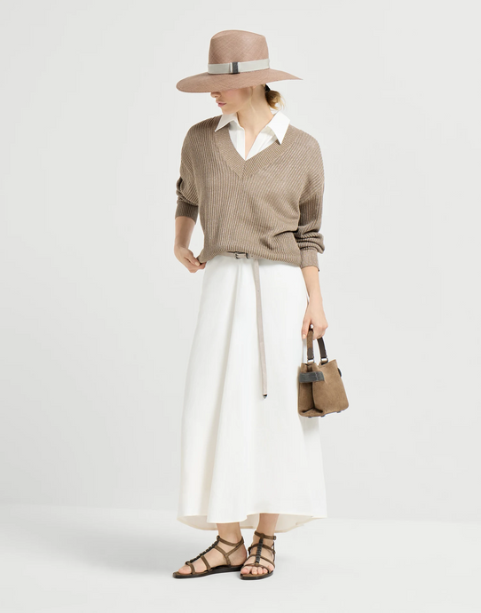Pure elegance in motion. A white dress by Brunello Cucinelli - where simplicity becomes statement. Clean lines, fluid silhouette, and effortless refinement for the season.